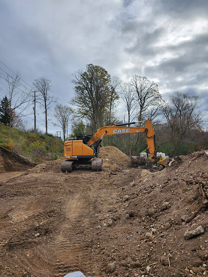 PMF Construction preparing retaining wall PMF Construction preparing retaining wall