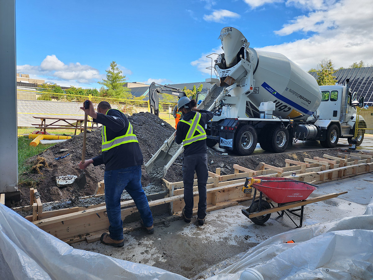 PMF Construction pouring concrete PMF Construction pouring concrete